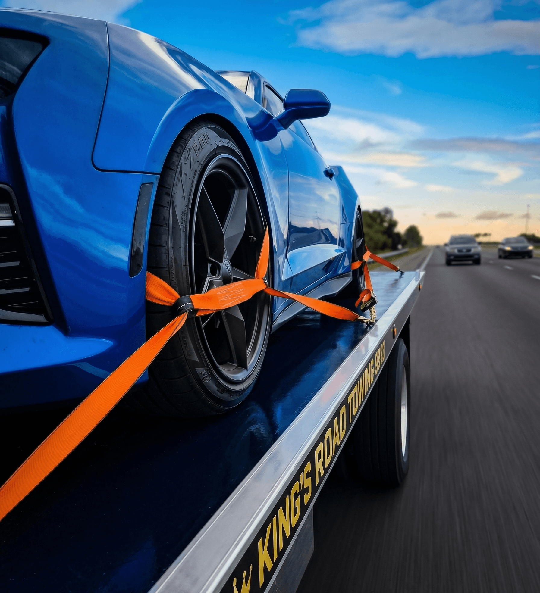 King's Road Towing flatbed truck on highway